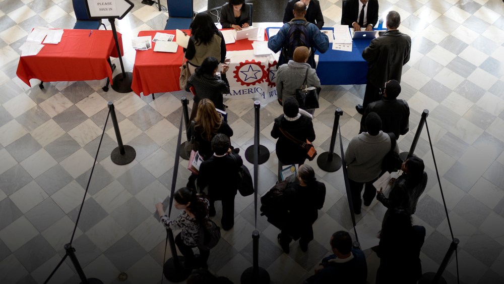 Job seekers wait to speak with employers at a job fair in Brooklyn, N.Y., on April 11, 2014. (Photo by Andrew Gombert/EPA)
