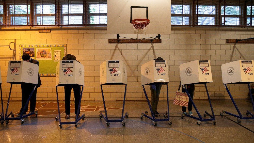 Residents of the Park Slope section of the borough Brooklyn vote in the 2014 U.S. midterm elections in on Nov. 4, 2014 in New York, N.Y. (Photo by Andrew Gombert/EPA)