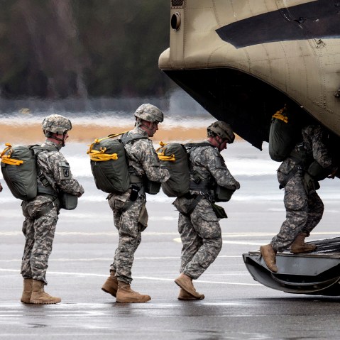 Paratroopers of the US Army enter a helicopter at the training area in Grafenwoehr, Germany on Feb. 10, 2014.