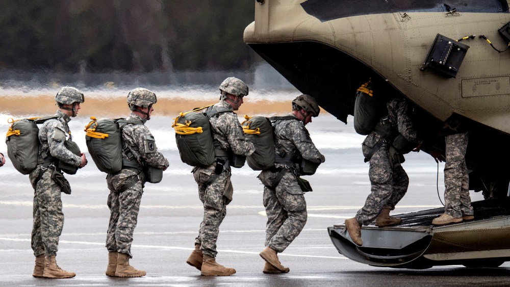 Paratroopers of the US Army enter a helicopter at the training area in Grafenwoehr, Germany on Feb. 10, 2014.