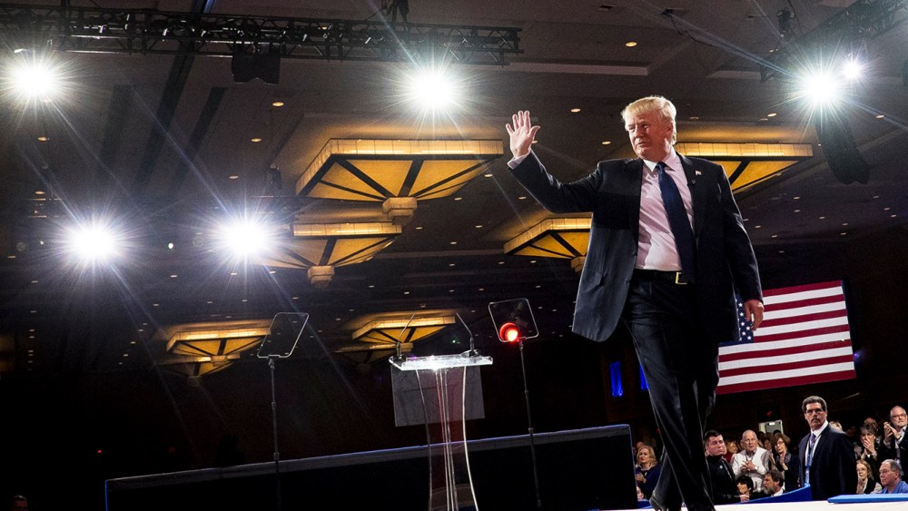 American businessman Donald Trump leaves the stage after addressing the American Conservative Union's 42nd Annual Conservative Political Action Conference (CPAC) in National Harbor, Md., on Feb. 27, 2015. (Photo by Pete Marovich/EPA)