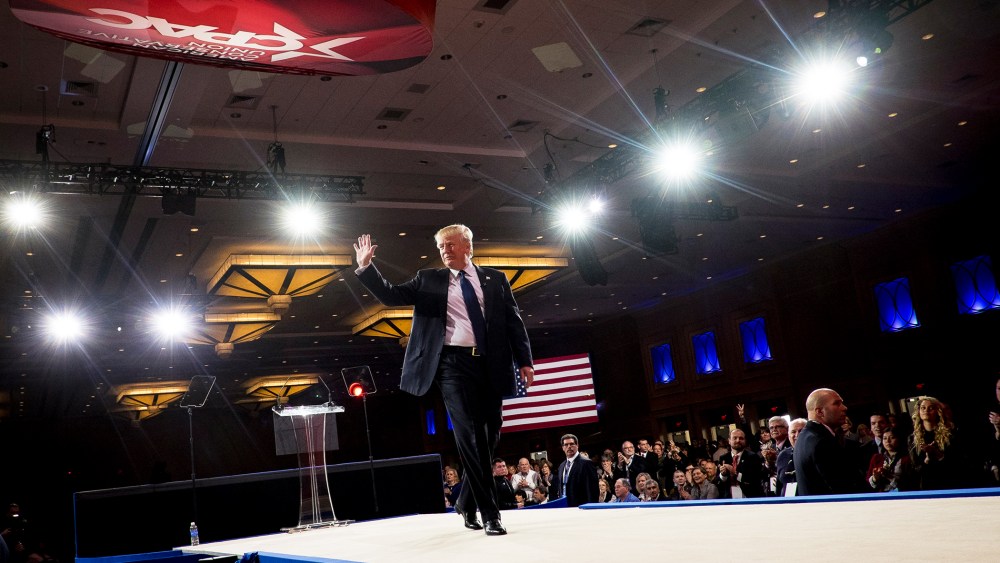 American businessman Donald Trump leaves the stage after addressing the American Conservative Union's 42nd Annual Conservative Political Action Conference (CPAC) in National Harbor, Md., on Feb. 27, 2015. (Photo by Pete Marovich/EPA)