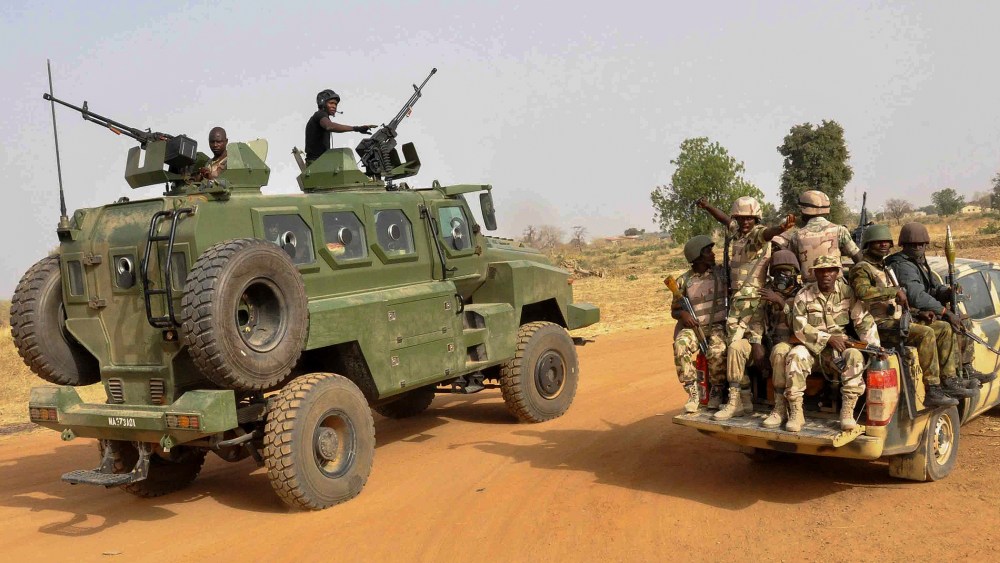 A photograph made available on March 8 2015 shows the Nigerian army patrolling in Chibok, Borno State, North Eastern Nigeria on March 5, 2015. (Photo by Henry Ikechukwu/EPA)