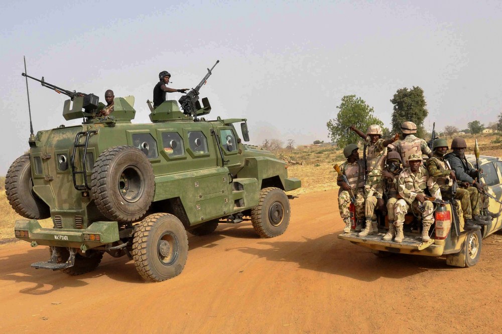 A photograph made available on March 8 2015 shows the Nigerian army patrolling in Chibok, Borno State, North Eastern Nigeria on March 5, 2015. (Photo by Henry Ikechukwu/EPA)