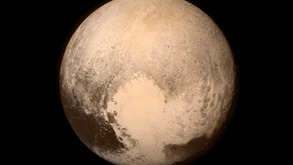 A handout picture made available by NASA shows Pluto nearly filling the frame in the Long Range Reconnaissance Imager (LORRI) aboard NASA's New Horizons spacecraft, taken on July 13, 2015. (Photo by NASA/APL/SWRI/EPA)