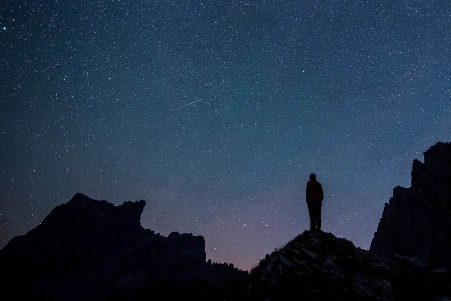 Stars and shooting stars are pictured during the annual Perseids meteor shower, with the 2827-meters Drusenfluh mountain (L) and the 2817-meters Sulzfluh mountain (R), in St. Antoenien in the canton of Grisons, Switzerland, on Aug. 13, 2015.