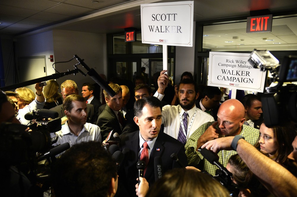 Republican presidential candidate Scott Walker meets the media in the Spin Room following the second GOP Presidential candidates debate at the Ronald Reagan Presidential Library in Simi Valley, Calif., Sept. 16, 2015. (Photo by Mike Nelson/EPA)