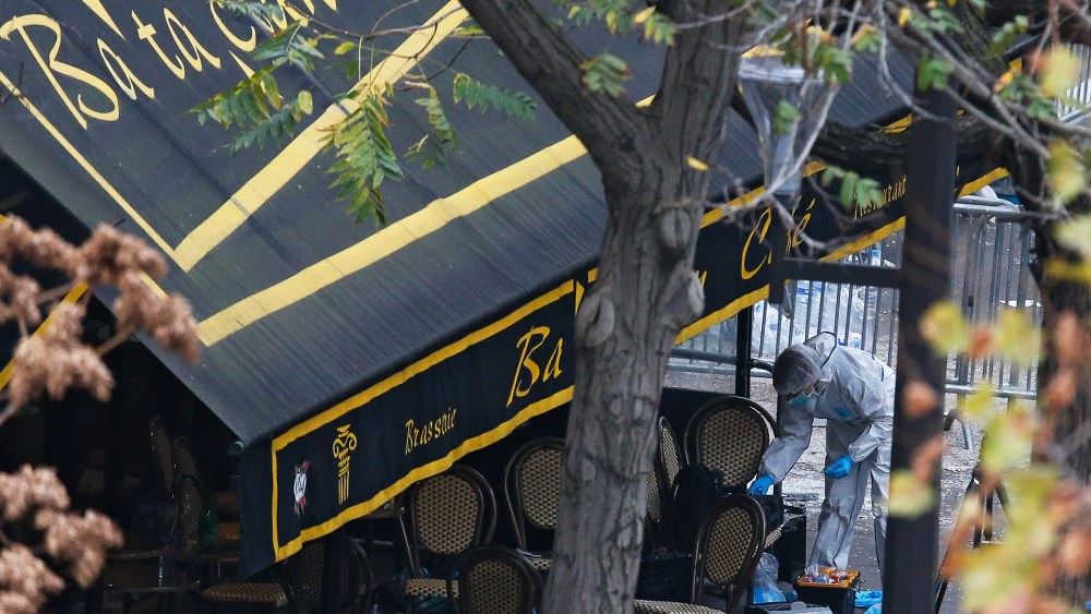 Crime scene investigators work at the Bataclan concert venue in Paris, France, Nov. 14, 2015. (Photo by Laurent Dubrule/EPA)