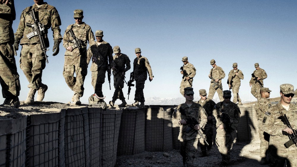 Paratroopers from Bull Battery, 1-319th Field Artillery Battalion pack their duffles for the unit's movement home from Afghanistan on Jan. 25, 2013.