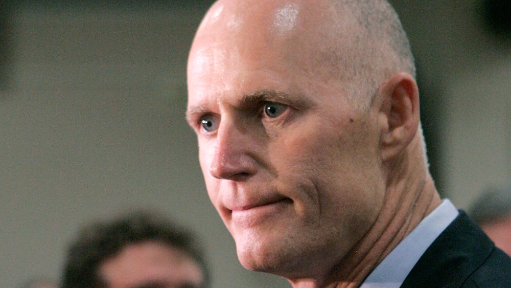 File Photo: Gov. Rick Scott expresses his disappointment about the supreme court's decision concerning the health care bill at a news conference on Thursday, June 28, 2012, in Tallahassee, Fla.   (Photo by Steve Cannon/AP Photo File)