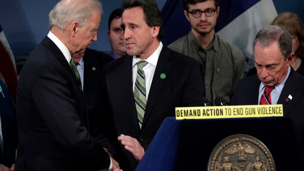Vice President Joe Biden shakes hands with Neil Heslin, center, whose son Jesse Lewis died at the school shootings in Newtown, Conn., after Biden spoke in New York's City Hall Blue Room, Thursday, March 21, 2013. Relatives of shooting victims from...