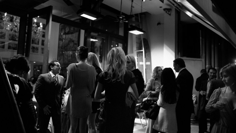 People are seen in a restaurant in New York City.