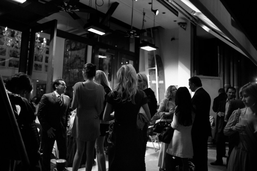 People are seen in a restaurant in New York City.