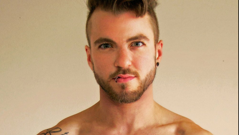 A photograph of Aydian Dowling, from FTM Magazine.