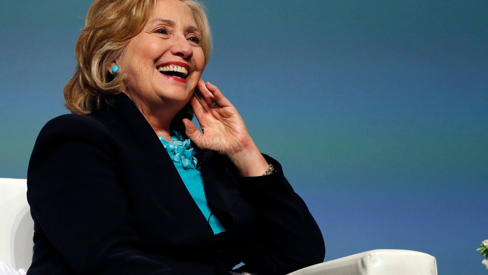 Former Secretary of State Hillary Rodham Clinton speaks at the Massachusetts Conference for Women in Boston on Dec. 4, 2014. (Photo by Elise Amendola/AP)