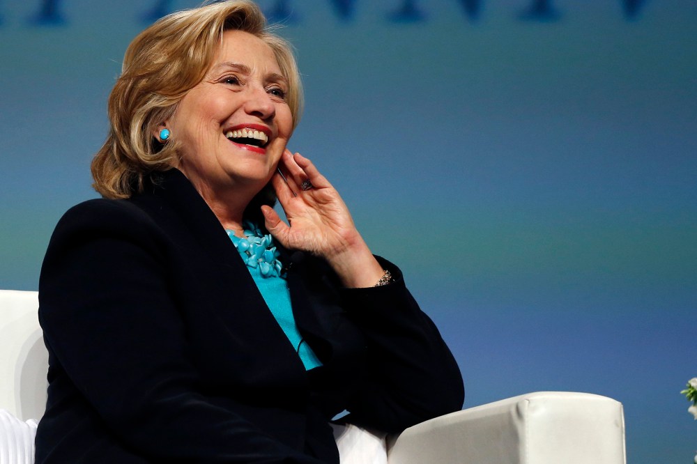 Former Secretary of State Hillary Rodham Clinton speaks at the Massachusetts Conference for Women in Boston on Dec. 4, 2014. (Photo by Elise Amendola/AP)