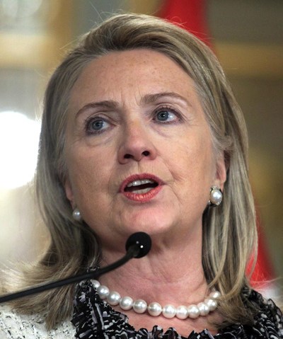 Image: U.S. Secretary of State Hillary Clinton gives a speech to the media at the government palace in Lima
