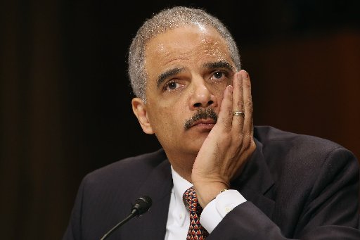 File Photo: U.S. Attorney General Eric Holder testifies before the Senate Judiciary Committee on Capitol Hill March 6, 2013 in Washington, DC. (Photo by: Chip Somodevilla/Getty Images)