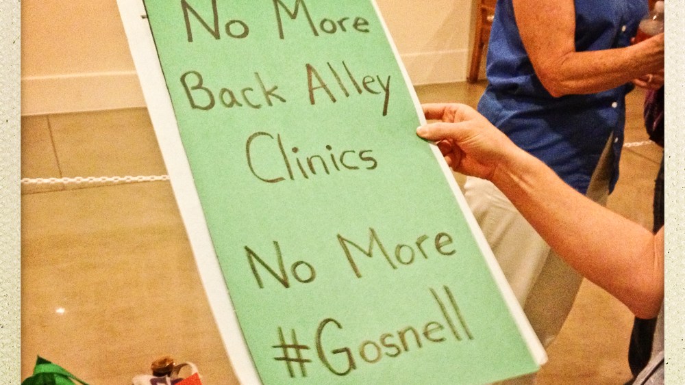 A pro-choice supporter inside the Texas state capitol to rally for and against the "Texas Abortion Bill" in Austin, Texas, on July 12, 2013.