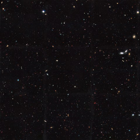 This Hubble Space Telescope view reveals thousands of galaxies stretching back into time across billions of light-years of space.