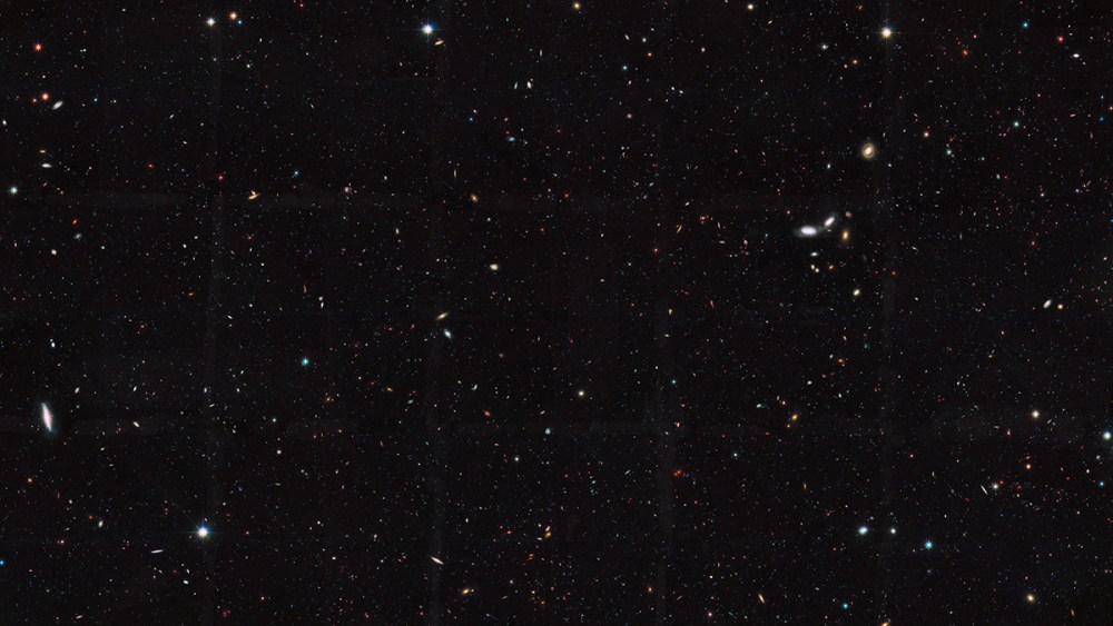 This Hubble Space Telescope view reveals thousands of galaxies stretching back into time across billions of light-years of space.