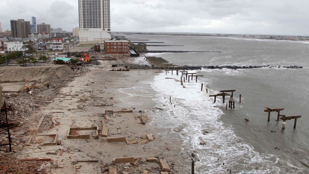 Foundations and pilings are all that remain of brick buildings and a boardwalk in Atlantic City, N.J., Tuesday, Oct. 30, 2012, after they were destroyed when a powerful storm that started out as Hurricane Sandy made landfall on the East Coast on Monday...