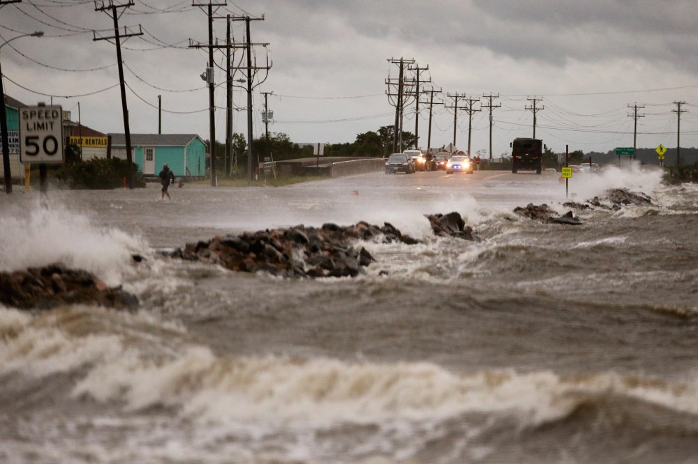 Strong winds and heavy surf cover Hwy 64 at the Albemarle Sound caused by Hurricane Arthur on July 3, 2014 in Nags Head, North Carolina.