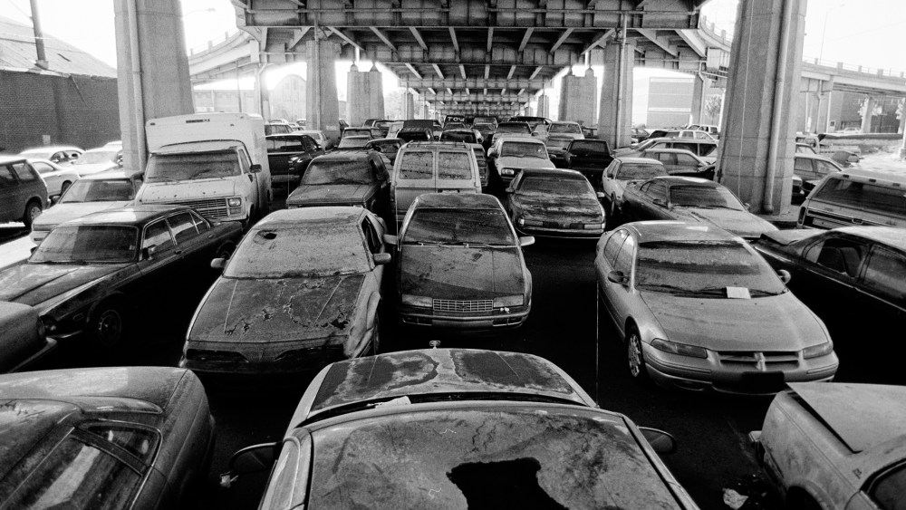 Months after Katrina previously flooded cars still remain under an overpass, December 2005-Janurary 2006. (Photo by Kadir van Lohuizen/NOOR/Redux)