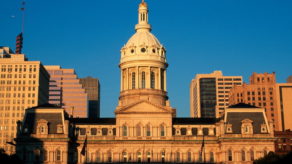 Early morning sunlight strikes the facade of Baltimore's City Hall, Md. (Photo by Paul Souders/Corbis)