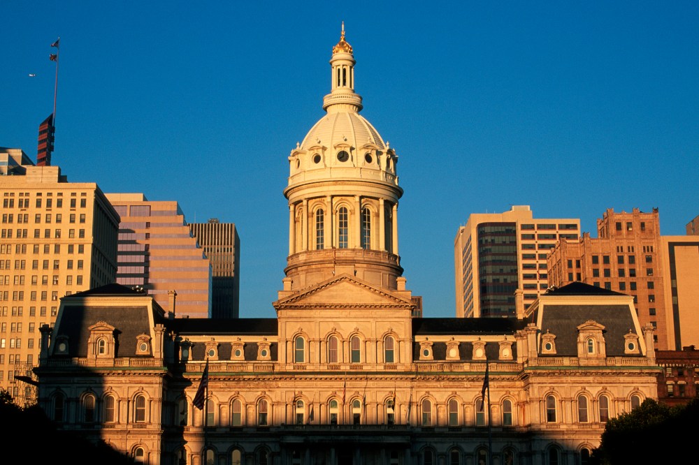 Early morning sunlight strikes the facade of Baltimore's City Hall, Md. (Photo by Paul Souders/Corbis)