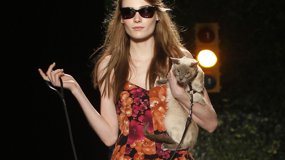 A model walks the runway at the Fall 2013 Tracy Reese Runway Show, on Sunday, February 10, 2013 in New York. (Photo by Dario Cantatore/Invision/AP)