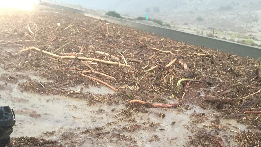 Heavy rains touched off flooding and mudslides in foothill communities north of Los Angeles, swamping cars and prompting major road closures. (Courtesy of Kayla Chamness)