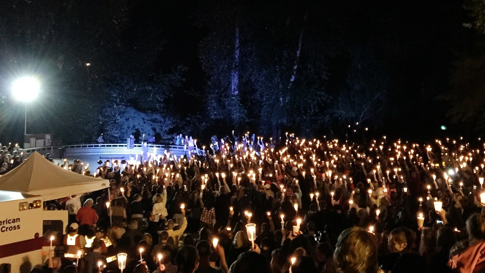 A candlelight vigil is held for the victims of the Umpqua Community College mass shooting in Stewart Park, Umpqua, Ore., Oct. 1, 2015. (Photo by Mike Brunker/NBC News)