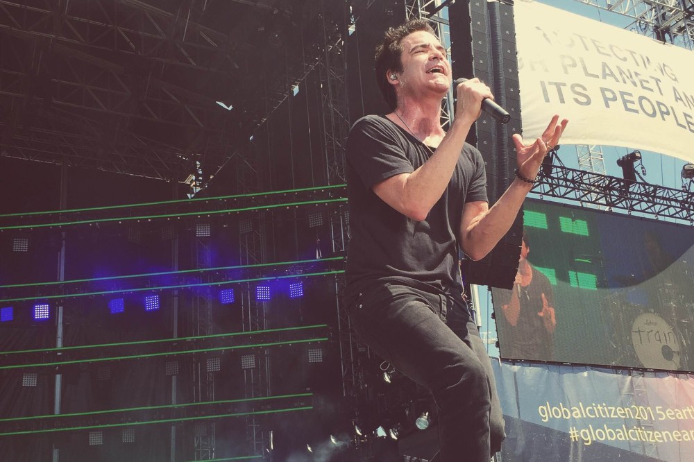 Lead singer Patrick Monahan performs with his band Train (not pictured) at the Global Poverty Project's Global Citizen 2015 Earth Day at the National Mall in Washington, DC, April 18, 2015. (Photo by Jared Soares/MSNBC)
