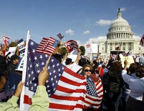 Demonstrators protest during an immigration reform rally in front of the U.S. Capitol on Capitol Hill in Washington in this October 13, 2009 file photo.