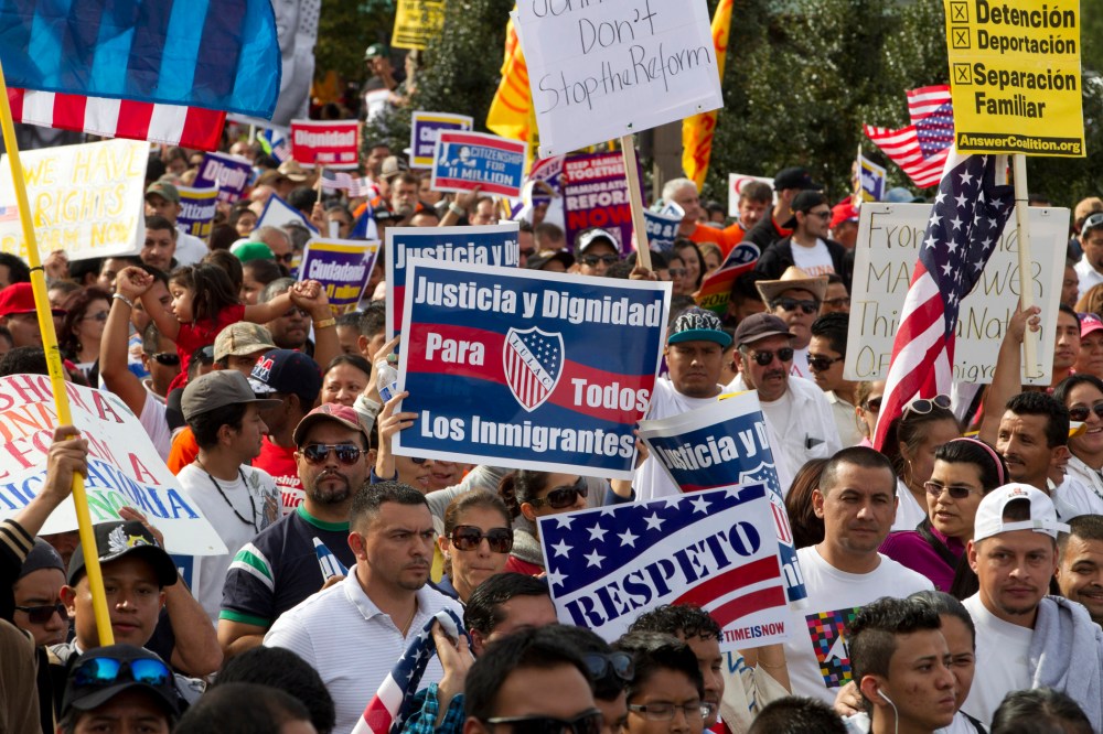 Demonstrators march towards Capitol Hill during a immigration march and rally in Washington, D.C. October 8, 2013.