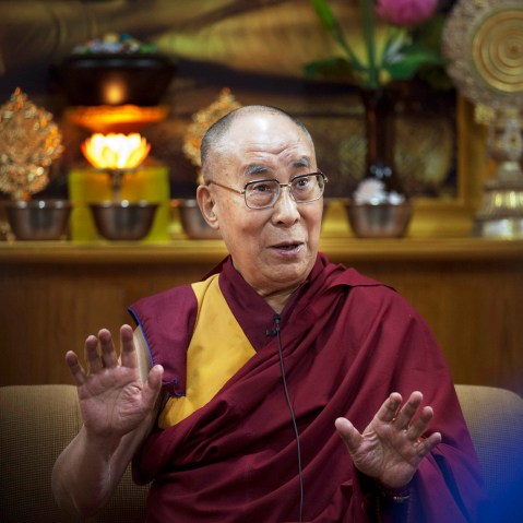 Tibetan spiritual leader the Dalai Lama gestures as he speaks to a group of youth leaders in Dharmsala, India on May 3, 2016. (Photo by Ashwini Bhatia/AP)