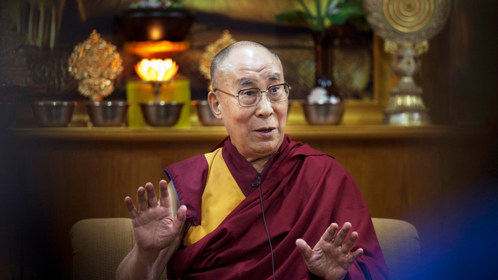 Tibetan spiritual leader the Dalai Lama gestures as he speaks to a group of youth leaders in Dharmsala, India on May 3, 2016. (Photo by Ashwini Bhatia/AP)