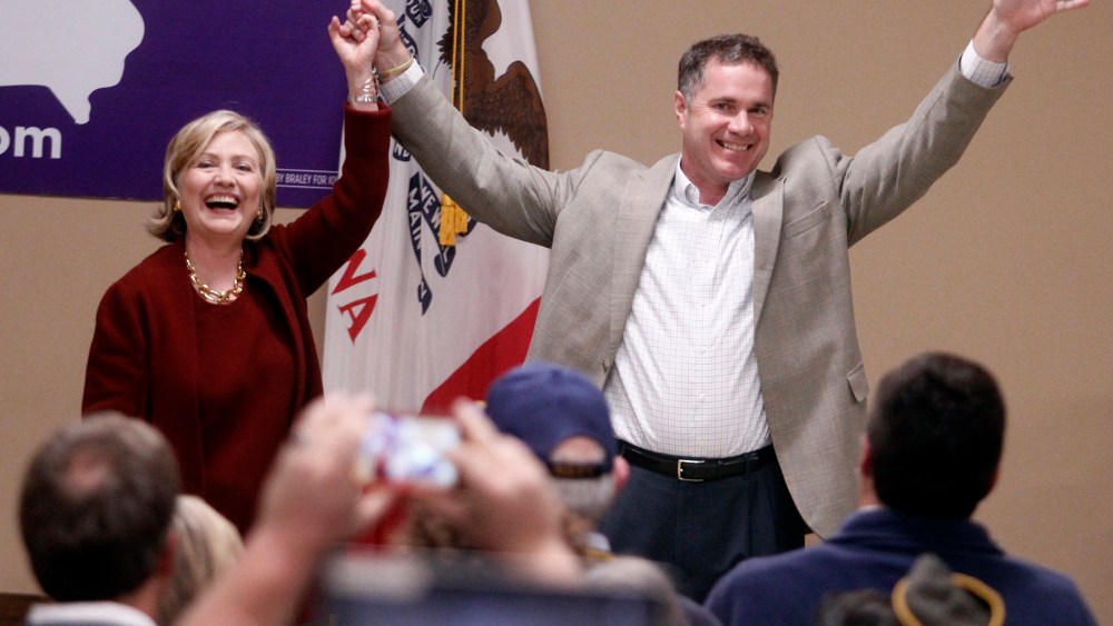 Former Secretary of State Hillary Rodham Clinton speaks and Rep. Bruce Braley, D-Iowa wave to supporters during a campaign even for his senatorial race, Wednesday, Oct. 29, 2014, in Cedar Rapids, Iowa.