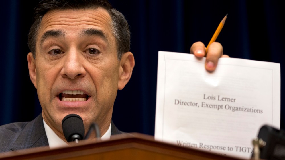 House Oversight Committee Chairman Rep. Darrell Issa, R-Calif. holds up a document as he speaks on Capitol Hill in Washington, Wednesday, May 22, 2013.