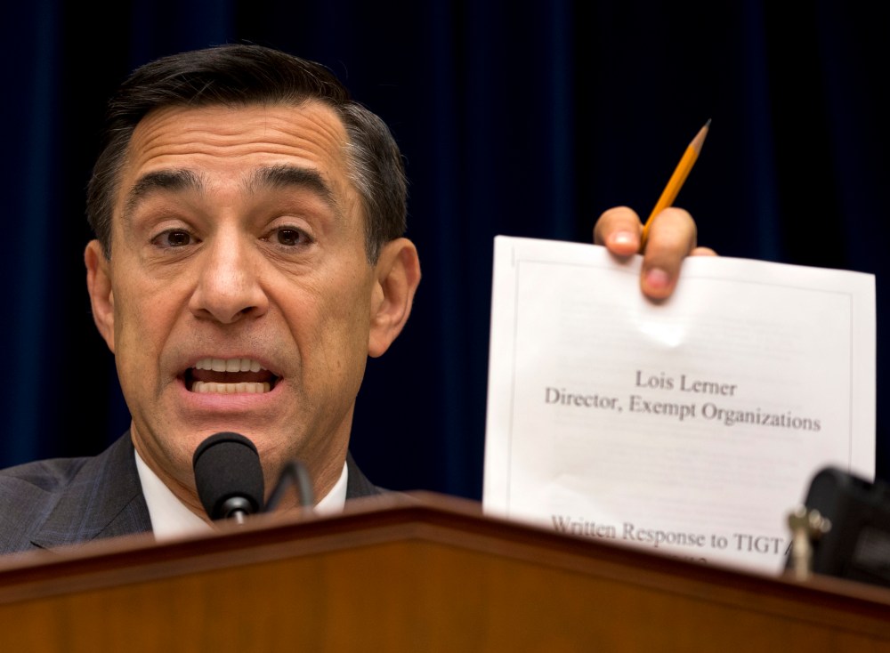 House Oversight Committee Chairman Rep. Darrell Issa, R-Calif. holds up a document as he speaks on Capitol Hill in Washington, Wednesday, May 22, 2013.
