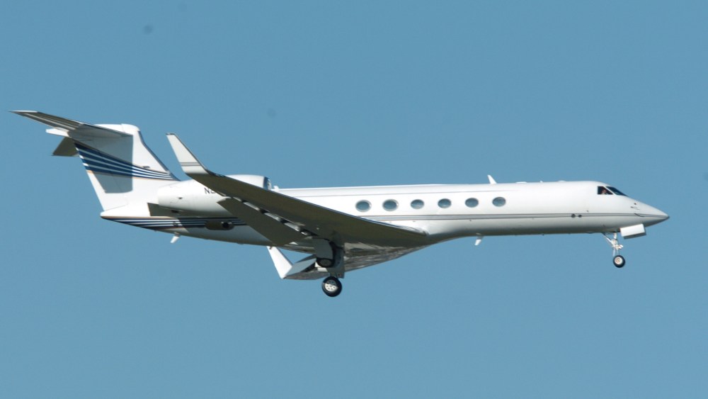 A Gulfstream V corporate jet carrying Nike employees flies over Hillsboro airport as it burns off fuel in Hillsboro, Ore., Monday Nov. 21, 2005. The plane developed landing gear problems shortly after leaving suburban Hillsboro airport on Monday and it...