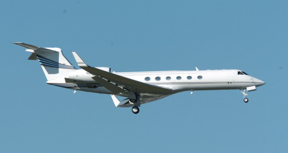 A Gulfstream V corporate jet carrying Nike employees flies over Hillsboro airport as it burns off fuel in Hillsboro, Ore., Monday Nov. 21, 2005. The plane developed landing gear problems shortly after leaving suburban Hillsboro airport on Monday and it...