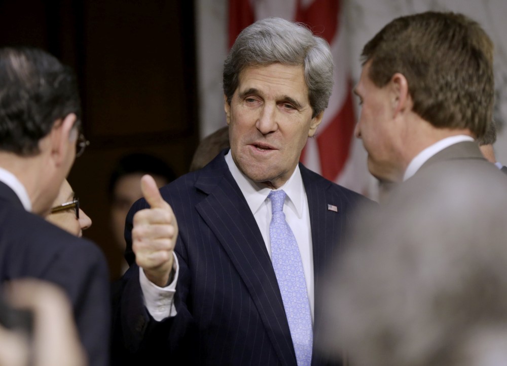 Senate Foreign Relations Chairman Sen. John Kerry, D-Mass., President Barack Obama's nominee to become secretary of state, gives a 'thumbs-up' as he arrives  on Capitol Hill in Washington, Thursday, Jan. 24, 2013, to testify before his confirmation...