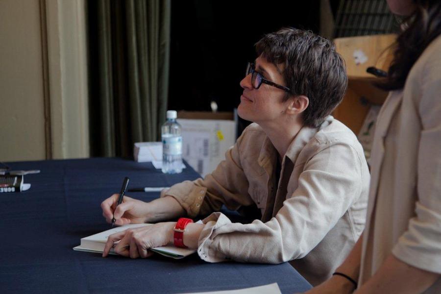 Rachel signs a copy of her book in Portland, OR on Sunday, April 15.