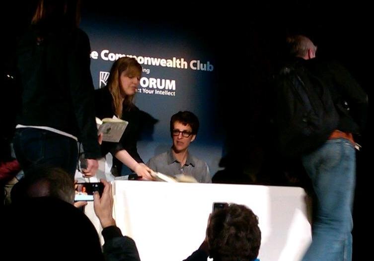 Rachel signs copies of her book 