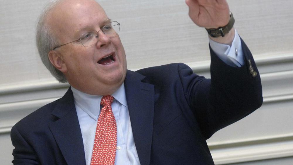 Karl Rove, former deputy chief of staff and senior adviser to President George W. Bush, speaks to members of the media before a Walton County Chamber of Commerce dinner at the Baytowne Conference Center, Thursday, Dec. 1, 2011 in Sandestin, Fla  (AP...