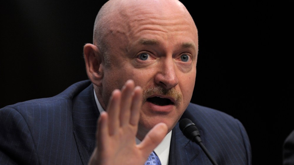 Mark Kelly, husband of former Arizona Rep. Gabrielle Giffords, who was seriously injured in the mass shooting that killed six people in Tucson, Ariz. two years ago, testifies on Capitol Hill in Washington, Wednesday, Jan. 30, 2013, before the Senate...