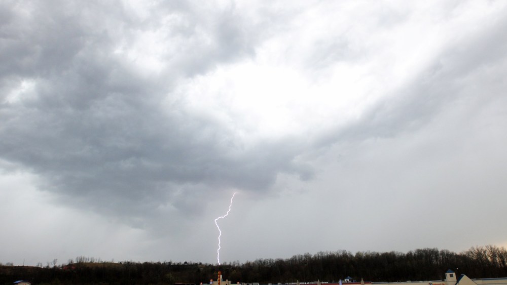 Lightning strikes as a thunderstorm passes over the KYOVA Mall, April 8, 2015, in Cannonsburg, Ky. (Photo by Kevin Goldy/The Independent/AP)