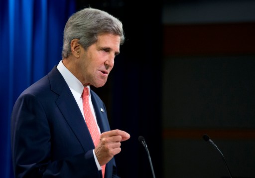 Senate Foreign Relations Committee Chairman Sen. John Kerry, D-Mass. walks to the Senate floor on Capitol Hill in Washington, Tuesday, Dec. 4, 2012.   (AP Photo/J. Scott Applewhite)